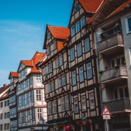 Picture of traditional timber‑framed buildings along a street in a historic town